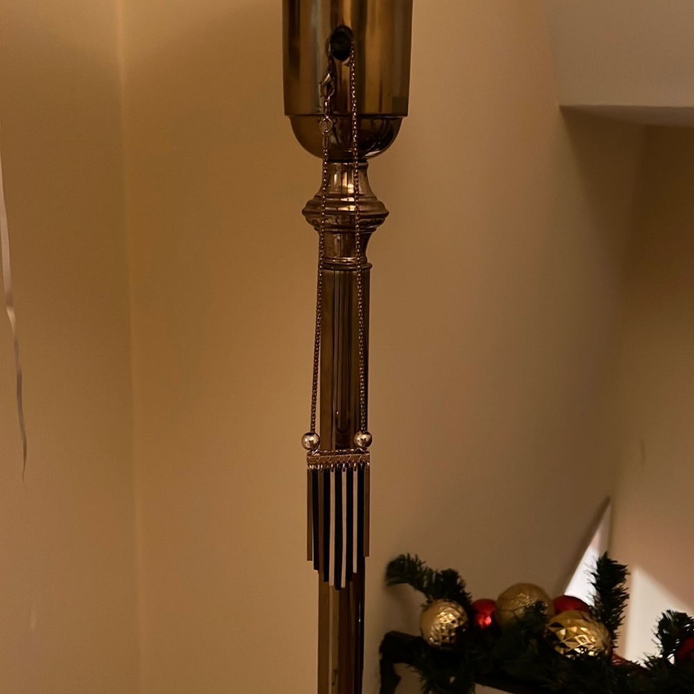 Faux gold tassle necklace with black detailing. Pretty and flowy.